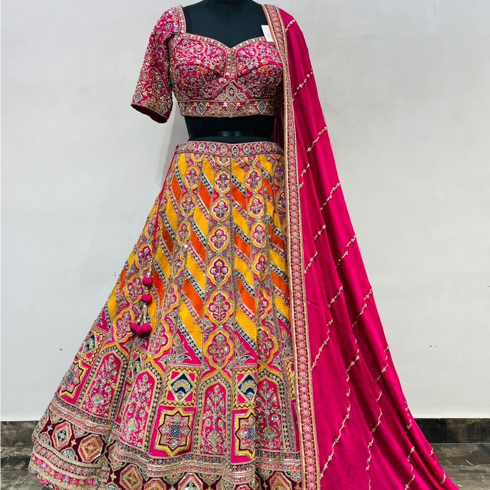 Vibrant Pink and Orange Banarasi silk Lehenga bridal wear